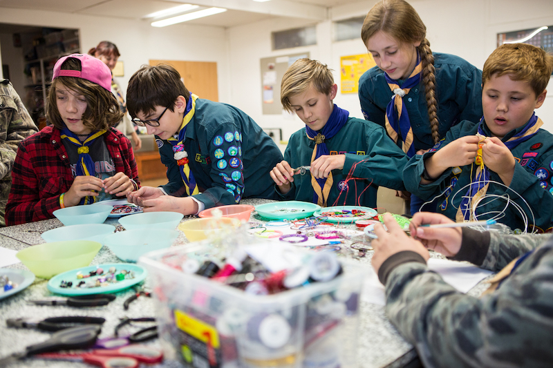 Scouts working on a craft activity